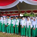 MTsN 2 Tanjabtim Dipercaya Sebagai Pengiring Lagu Nasional HUT Ke 80 RI Di Kec.Rantau Rasau.